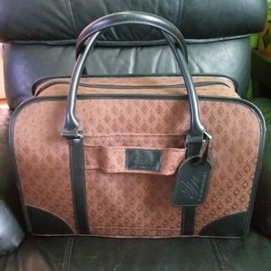 Joy Mangano weekender travel tote. Very classy.